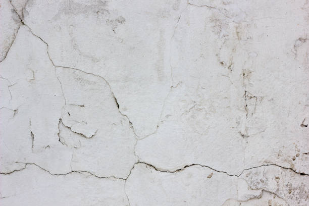 istock Old weathered concrete wall texture with number of scratches. 898780558