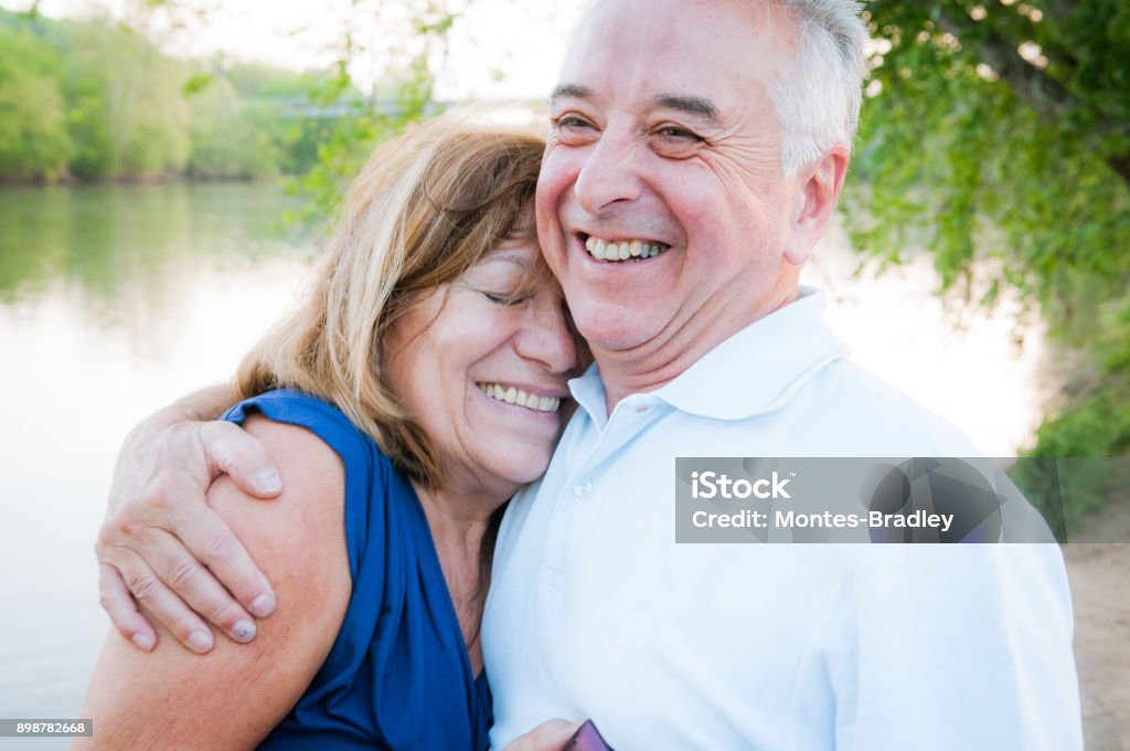 Abuelos, the Latino Grandparents A white Spanish-Latino couple romantic embrace. AARP Stock Photo