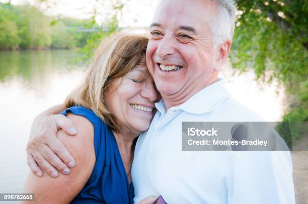 Abuelos The Latino Grandparents Stock Photo - Download Image Now - AARP, Couple - Relationship, Embracing
