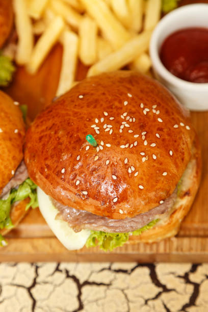 istock burgers with bacon, lettuce and sesame seeds 898784750