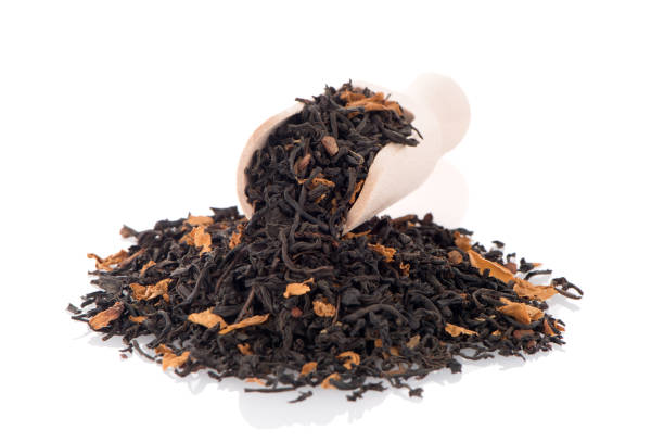 istock Black Dry Tea with a Wooden Spoon 898784972