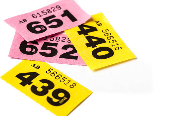 istock Yellow and Pink Raffle Tickets on white background 898785970