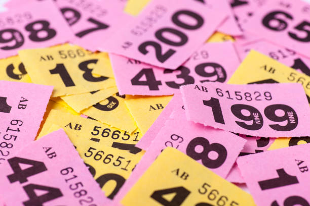 Lots of raffle tichets ready to be drawn Lots of raffle tichets ready to be drawn token photos stock pictures, royalty-free photos & images