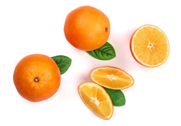 istock Orange with slice and leaf isolated on the white background. Flat lay pattern. Top view 898790336