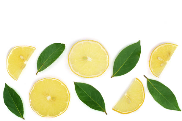 istock lemon with leaves and slices isolated on white background with copy space for your text. Flat lay, top view 898793352