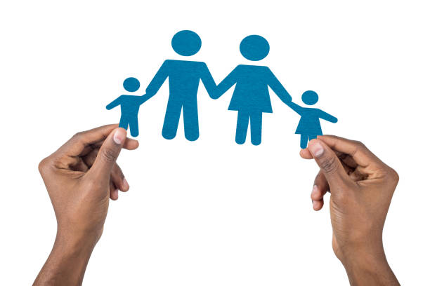 Two hands clasp together in a display of affection, surrounded by a colorful background. Silhouettes of a family symbolize the bond of love and togetherness.