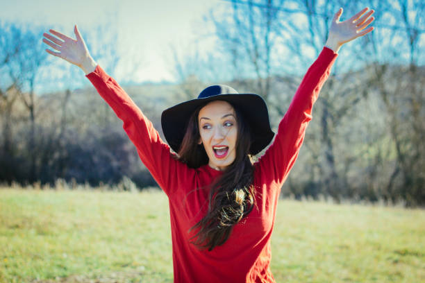 istock Beautiful woman outside in a park. 898797722
