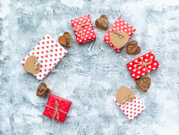 istock Valentine frame with gift boxes and hearts.. Red decoration. flat lay composition 898801980