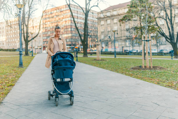 istock Mother and her baby in a park 898802934