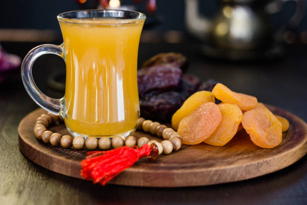 istock Ramadan juice for iftar made from fresh apricots with dried apricots and dates. 898806522