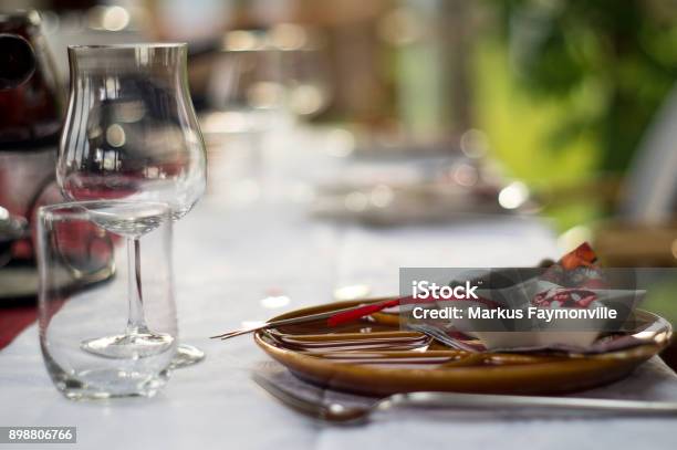 Plate And Cutlery With Christmas Decoration Stock Photo - Download Image Now - Pair, Wine, Arrangement