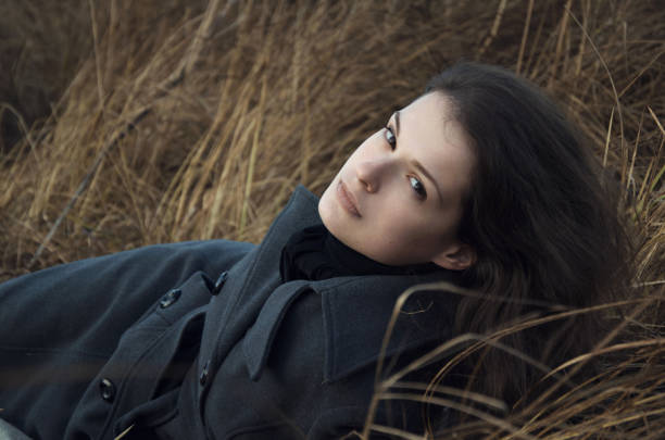 istock young woman among autumn grasses 898817888