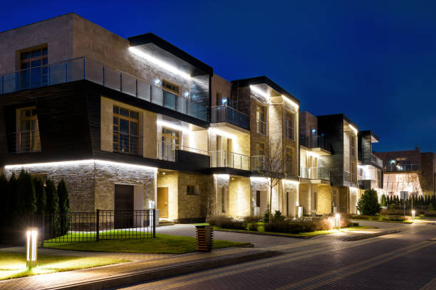 istock Townhouses in the night town 898825164