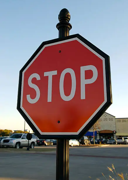 A stop sign in a Texas shopping center.