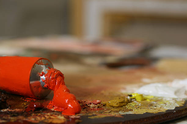 istock Red oil color on a palette 89882851