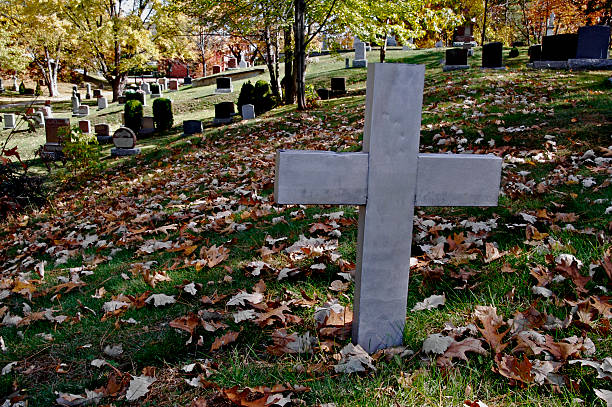 Metal Graveyard Cross stock photo