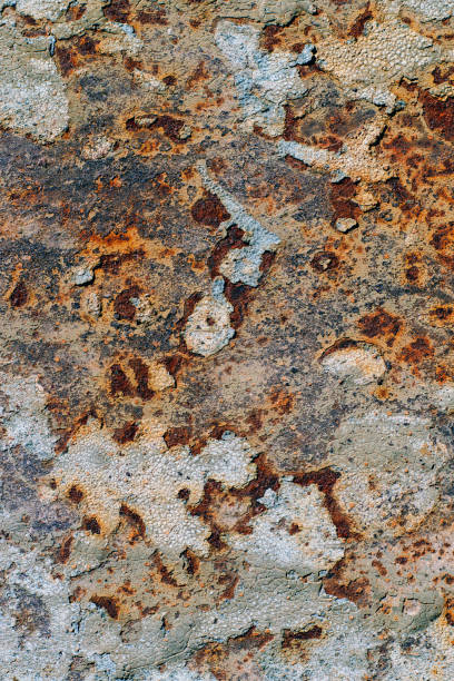 istock texture of rusty iron, cracked paint on an old metallic surface, sheet of rusty metal with cracked and flaky paint,  corrosion, decay metal background, decay steel, decay 898829148