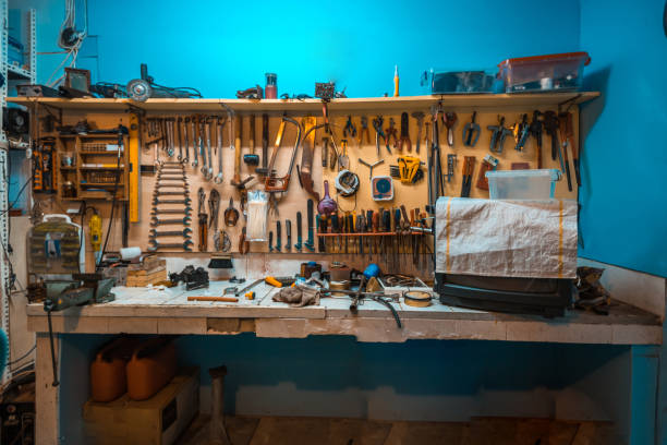 istock old rusty tools in wooden wall in garage 898829352