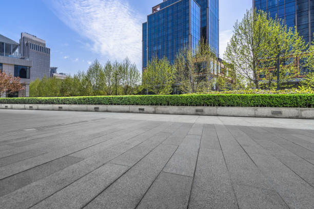 istock Empty pavement front of modern office buildings 898830602