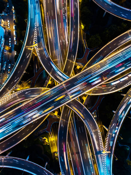 Highway junction aerial view Shanghai highway junction aerial view at night time bustling city stock pictures, royalty-free photos & images