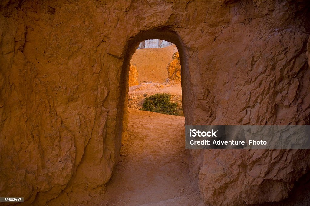 Carved Arch Bryce Canyon Carved archway and door through the rock. Arch - Architectural Feature Stock Photo