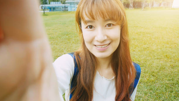 istock Young woman looking at camera 898838082