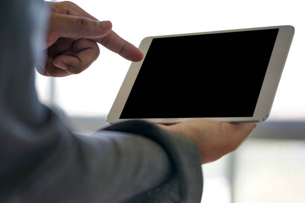 istock Closeup view  business team working  use Tablet pc using digital to connecting  touching screen 898839174