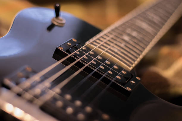 istock Black Electric Guitar Body Fragment 898843174