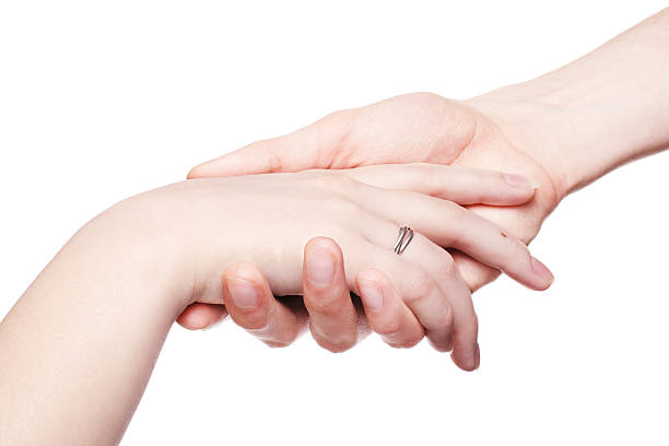 istock The man gently holds a female hand 89884609