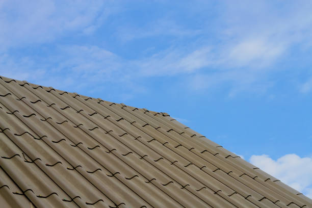 istock roof tiles on blue sky background 898848988