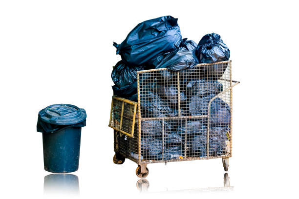 istock Black trash inside garbage cart and plastic trash isolated on white background. 898849088