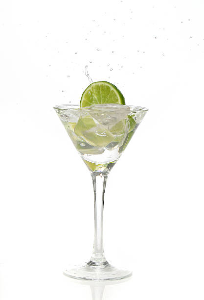 istock Lime splashing into a cocktail glass 89885108