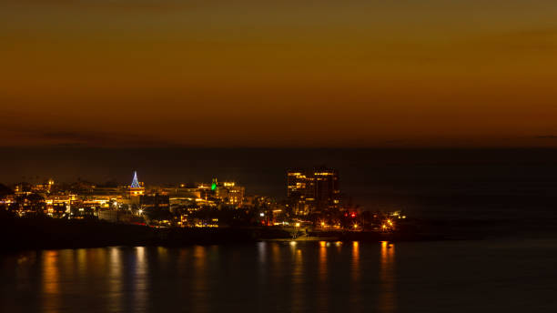 istock Sunset at La Jolla Shore with Christmas light 898853384