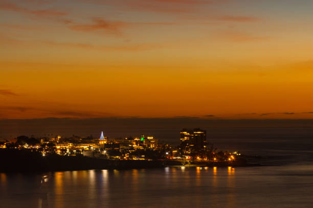 istock Sunset at La Jolla Shore with Christmas light 898853392