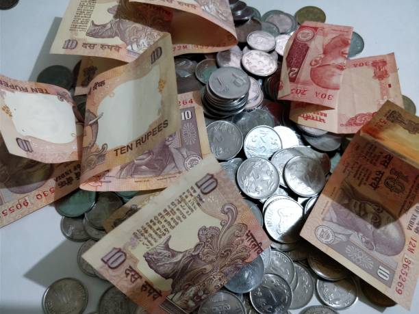 istock Indian Currency Coins and Rupees 898856530