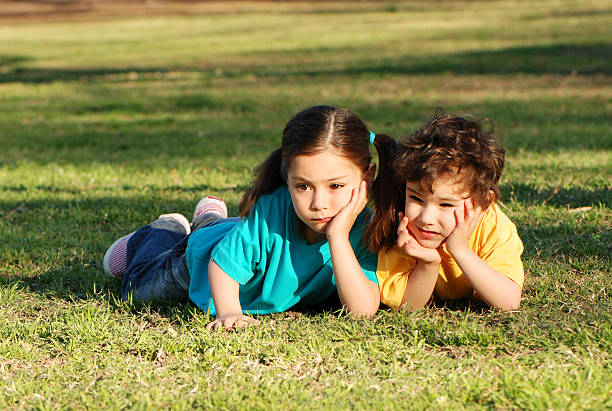 istock Children on a grass in park 89885807
