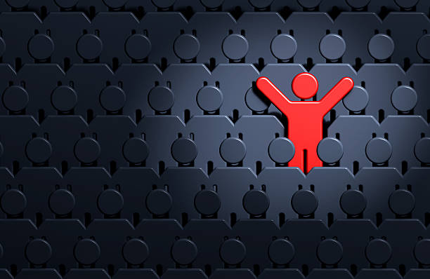 Graphic design image of red man standing out amongst crowd stock photo