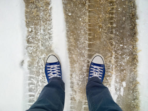 istock Feet in the snow. 898860574