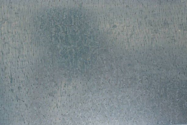 istock galvanized steel plate background - metallic stainless corrugated chrome texture 898861558
