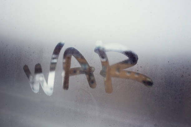 istock Autumn rain, the inscription on the sweaty glass - war 898864310