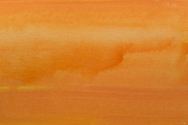 istock orange watercolor painted texture background  on paper 898865836