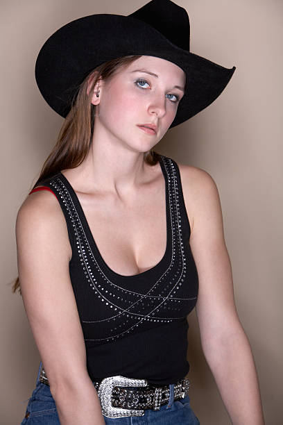 istock Beautiful Cowgirl posing 89886628