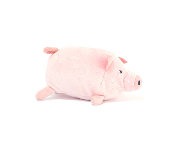 istock Closeup cute pink pig doll isolated on white background 898873594
