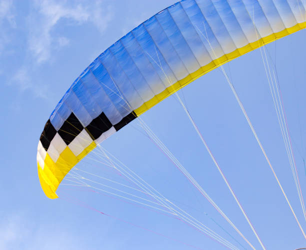 istock extreme sport parachute in the sky 898873636