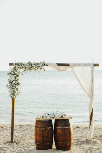 istock Beautiful wedding arch on the beach 898874534