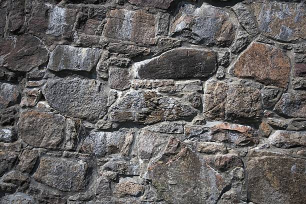 Ancient Stone wall background stock photo