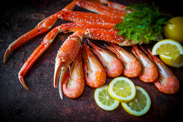 istock Seafood. Crab Legs. crab legs with fresh lemon 898877898