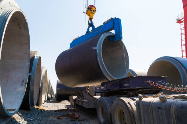 istock Cement pipe products, outdoor production line 898878400