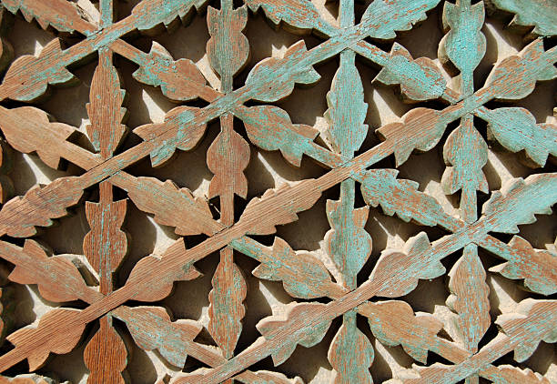 ornamental pattern on buddist temple door stock photo