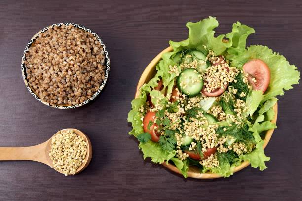 istock Fresh vegetable salad. Prospects buckwheat. Cooked porridge 898881582